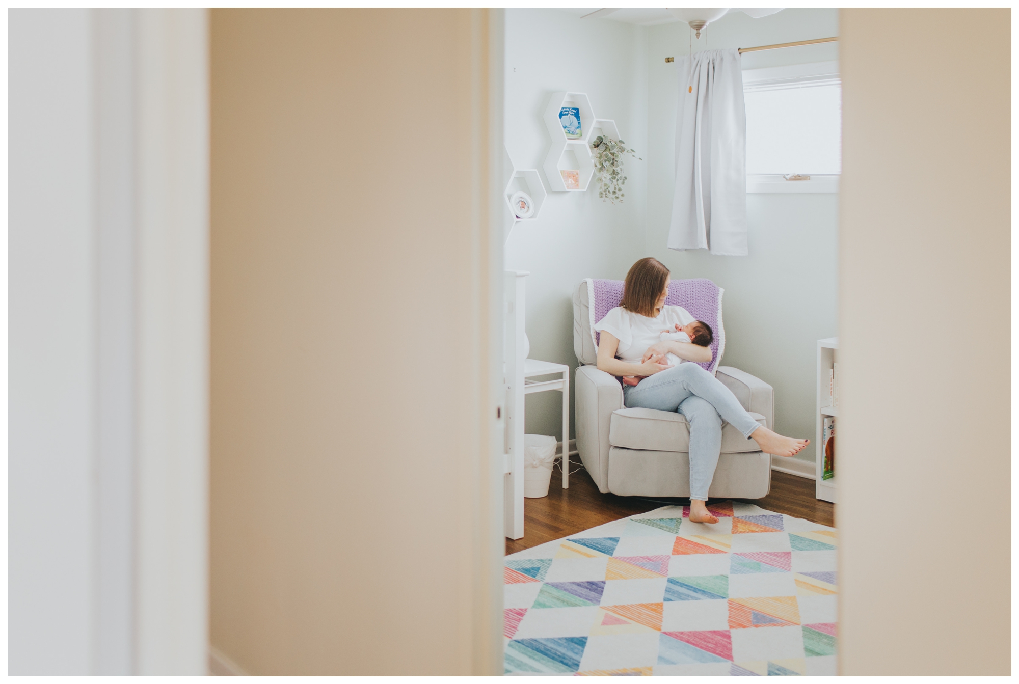 mom and baby in nursery; lifestyle photos