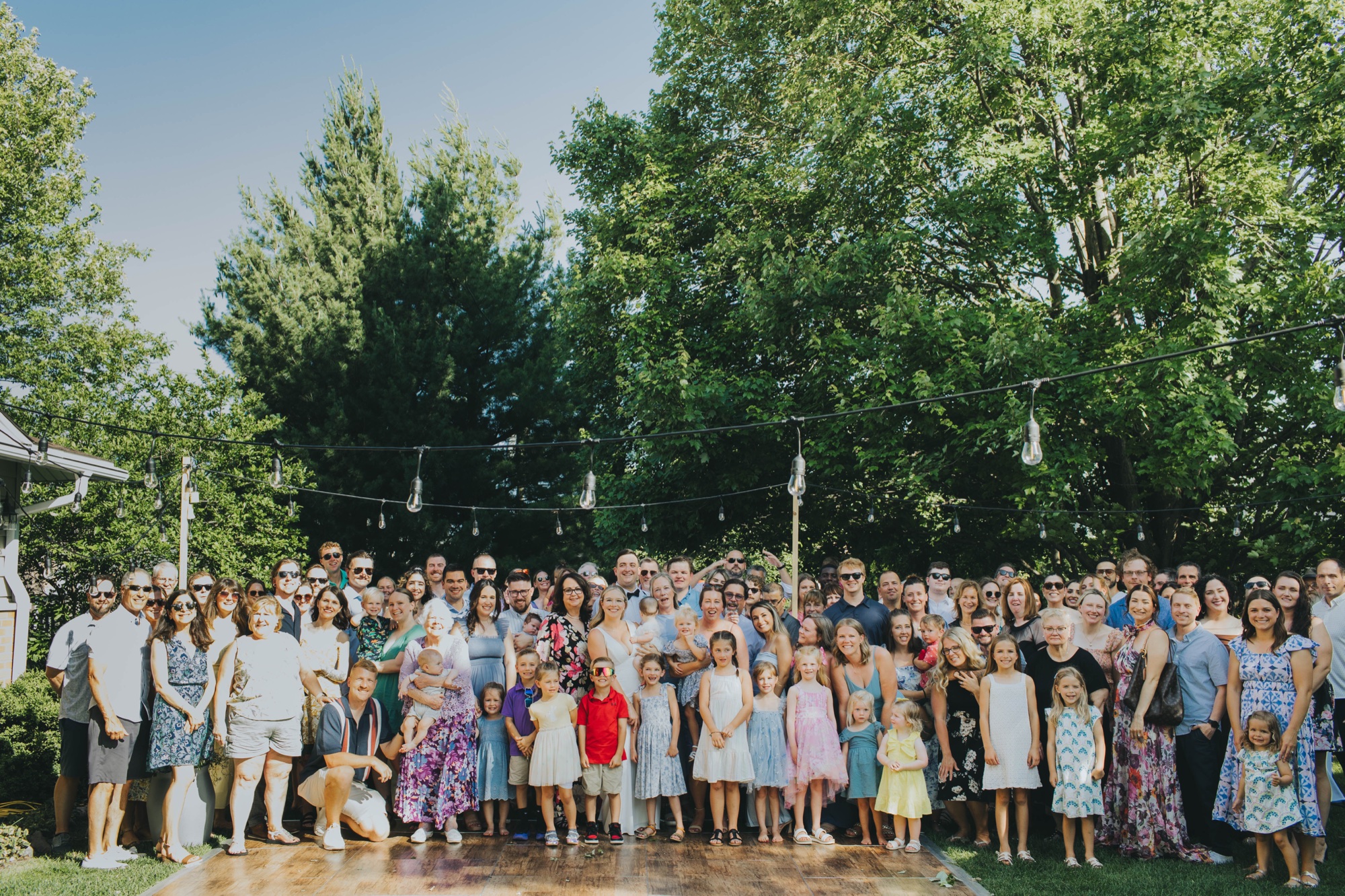 Family portraits during Chicago suburbs backyard wedding